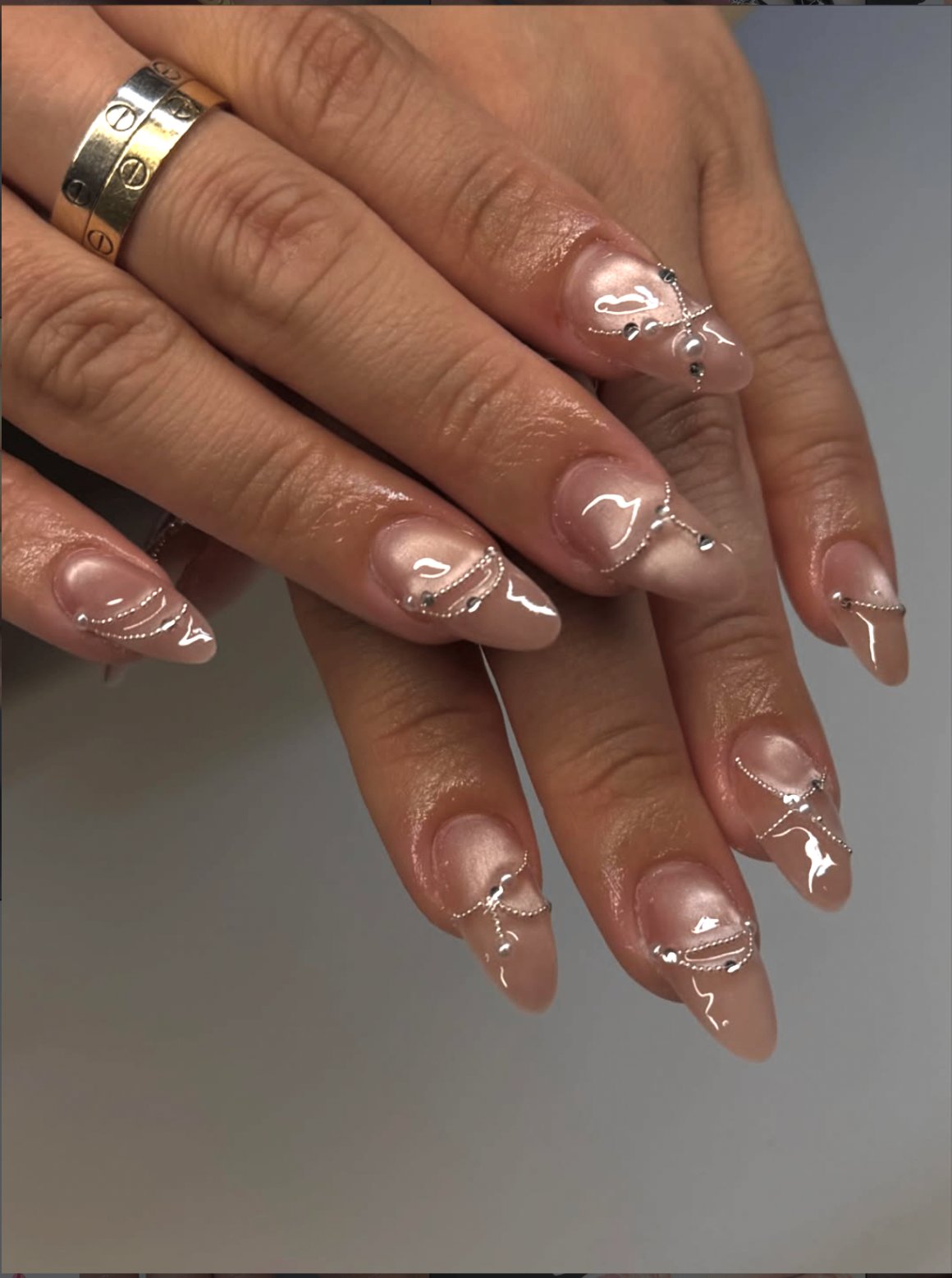 Pearl chrome nail set close-up